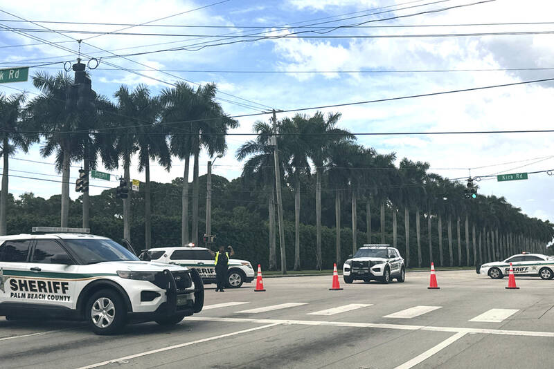 Sheriff vehicles are pictured near Trump International Golf Club, Sunday. Sept. 15, 2024, in West Palm Beach, Fla., after gunshots were reported in the vicinity of Republican presidential candidate former President Donald Trump. (AP Photo/Stephanie Matat)