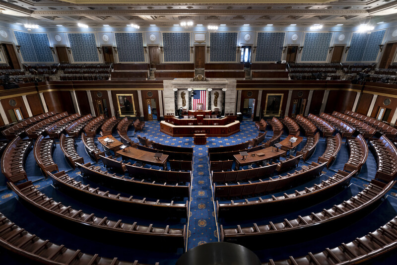 FILE - The chamber of the House of Representatives is seen at the Capitol in Washington, Feb. 28, 2022. In the 2024 elections, Republicans have won enough seats to control the U.S. House, completing the party's sweep into power and securing their hold on U.S. government alongside President-elect Donald Trump. (AP Photo/J. Scott Applewhite, File)