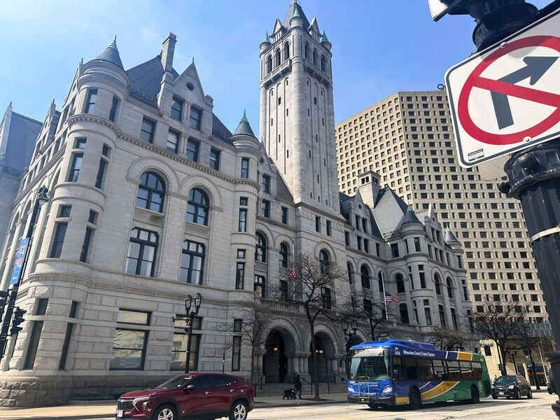 Traffic passes the Federal courthouse in Milwaukee on Friday, April 25, 2025. (AP Photo/Devi Shastri)