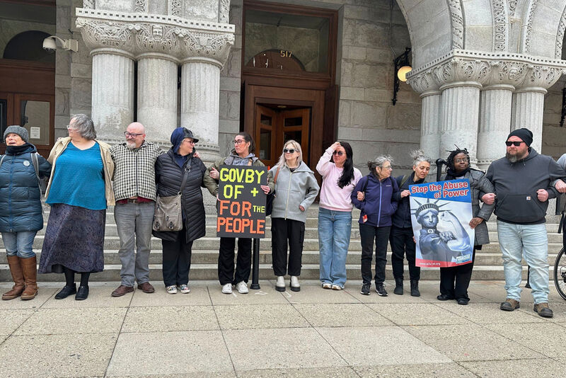People gather to demonstrate the arrest of Judge Hannah Dugan, outside the Federal courthouse in Milwaukee on Friday, April 25, 2025. (AP Photo/Devi Shastri)