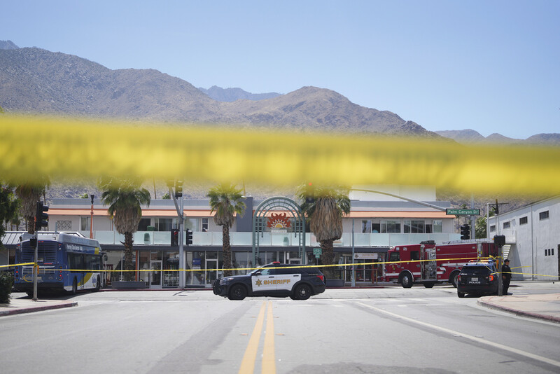 Police tape is placed across a street after an explosion Saturday, May 17, 2025, in Palm Springs, Calif. (AP Photo/Eric Thayer)