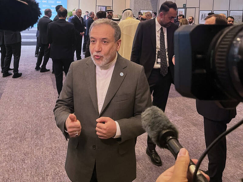 Iranian Foreign Minister Abbas Araghchi speaks to the media as he arrives to the Council of Foreign Ministers of the Organization of Islamic Cooperation meeting, in Istanbul, Turkey, Saturday, June 21, 2025. (AP Photo/Mehmet Guzel)