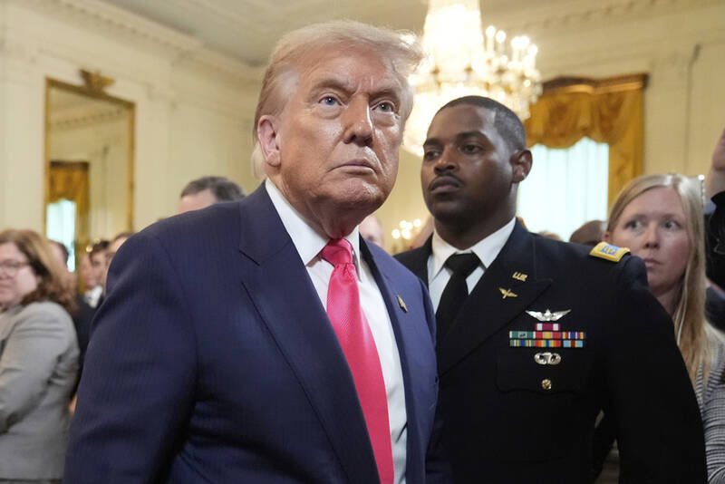 President Donald Trump departs after speaking at an event to promote his domestic policy and budget agenda in the East Room of the White House, Thursday, June 26, 2025, in Washington. (AP Photo/Mark Schiefelbein)
