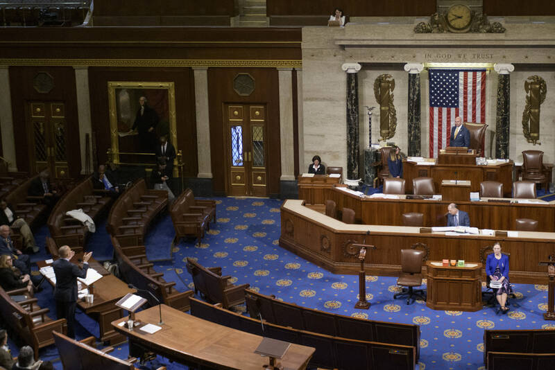 House Minority Leader Hakeem Jeffries, D-N.Y., left, speaks in the House chamber prior to the final vote for President Donald Trump's signature bill of tax breaks and spending cuts, at the Capitol, Thursday, July 3, 2025, in Washington. (AP Photo/Rod Lamkey, Jr.)