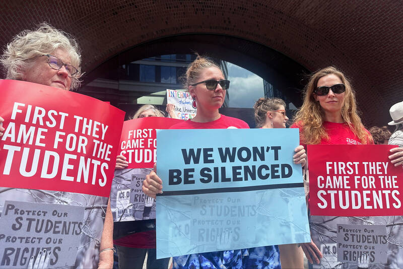People show their support for a lawsuit challenging the Trump administration's policy of targeting students for deportation who took part in pro-Palestinian demonstrations on Monday, July 7, 2025, at the federal courthouse in Boston. (AP Photo/Michael Casey)