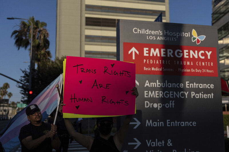 Protesters demonstrate against the planned closure of the trans youth clinic at Children's Hospital Los Angeles, Thursday, July 3, 2025, in Los Angeles. (AP Photo/Jae C. Hong)