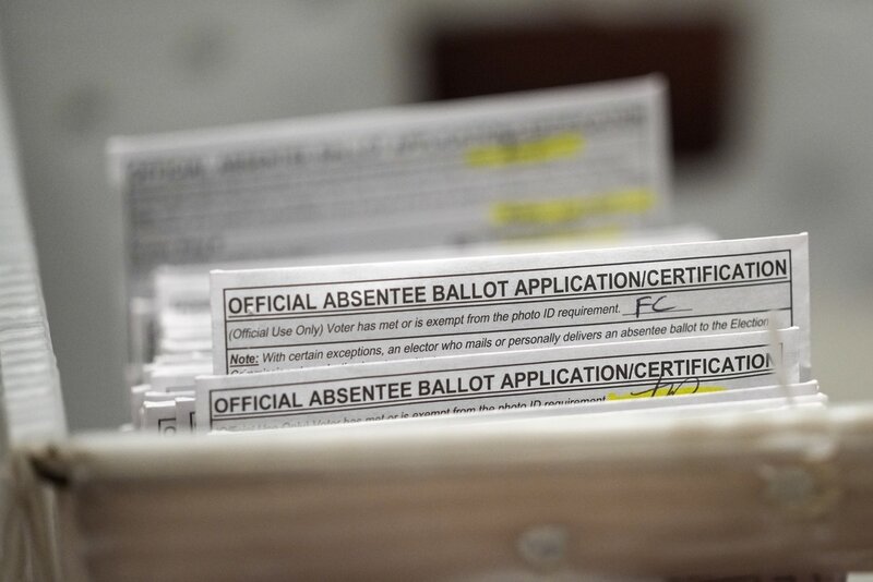 FILE - Absentee ballots during a count at the Wisconsin Center, Nov. 8, 2022, in Milwaukee. (AP Photo/Morry Gash, File)