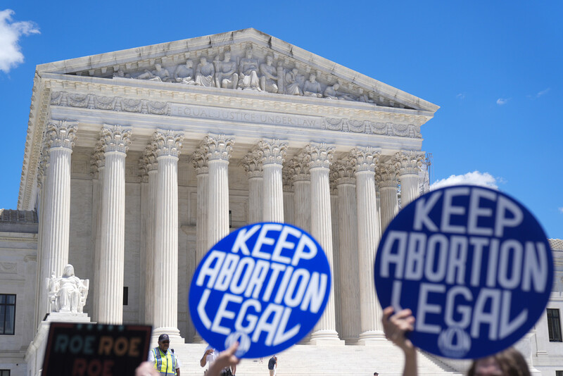 FILE - Abortion rights activists and Women's March leaders protest as part of a national day of strike actions outside the Supreme Court, June 24, 2024, in Washington. (AP Photo/Mark Schiefelbein, File)