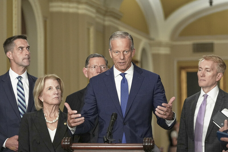 Sen. Majority Leader John Thune, R-S.D., center, speaks during a news conference after a policy luncheon at the Capitol Tuesday, July 29, 2025, in Washington. (AP Photo/Mariam Zuhaib)