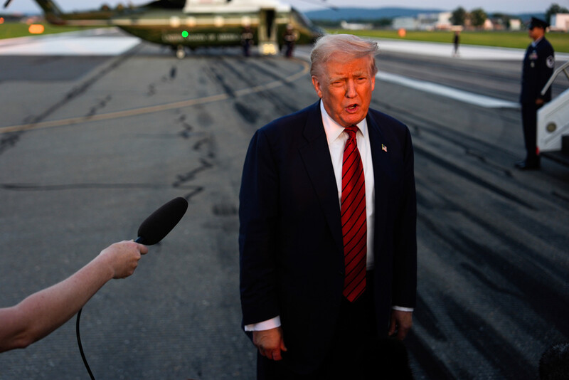 President Donald Trump speaks with reporters before boarding Air Force One at Lehigh Valley International Airport, Sunday, Aug. 3, 2025, in Allentown, Pa. (AP Photo/Julia Demaree Nikhinson)