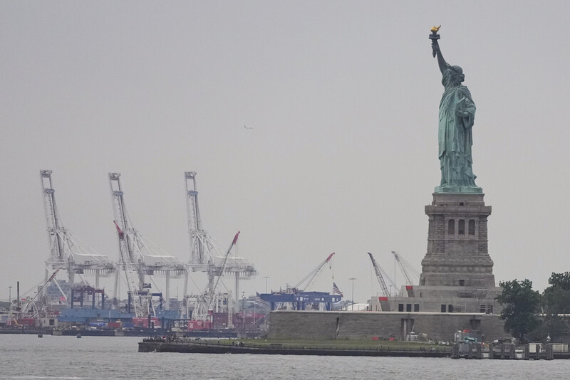 The Statue of Liberty is seen near Port Liberty Terminals, Wednesday, Aug. 6, 2025, in New York. (AP Photo/Frank Franklin II)