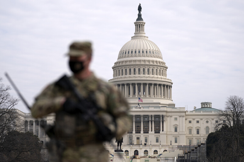 FILE - A member of the National Guard patrols the area outside of the U.S. Capitol in Washington, Feb. 10, 2021. (AP Photo/Jose Luis Magana, File)
