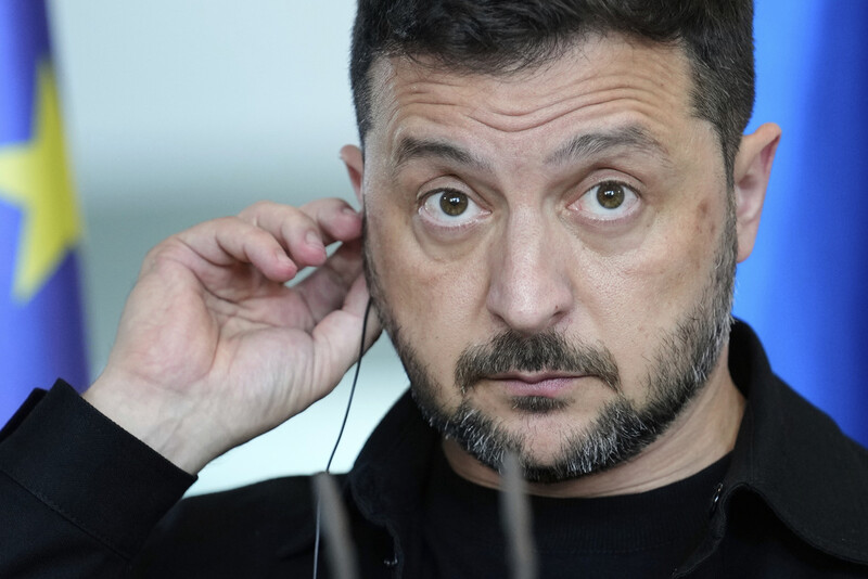 Ukrainian President Volodymyr Zelenskyy attends a joint press statement with German Chancellor Friedrich Merz following talks with European and U.S. leaders in Berlin, Germany, Wednesday, Aug. 13, 2025. (AP Photo/Ebrahim Noroozi)
