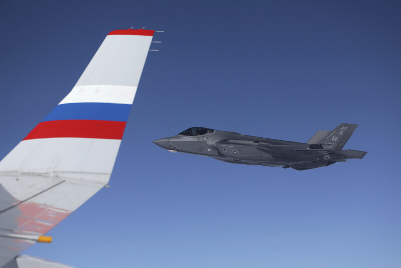 F-35 fighter escorts a Ilyushin Il-96-300 aircraft of the Russia Special Flight Squadron carrying Russian President Vladimir Putin back to Russia after his meeting with US President Donald Trump on Friday, Aug. 15, 2025, at Joint Base Elmendorf-Richardson, Alaska. (Gavriil Grigorov, Sputnik, Kremlin Pool Photo via AP)