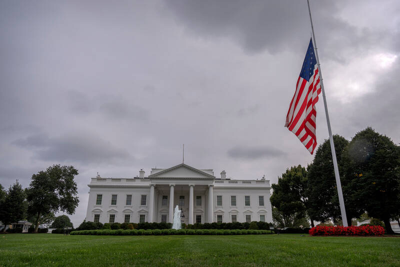 The American flag on the North Lawn at the White House in Washington, is lowered to half-staff after Charlie Kirk, the CEO and co-founder of Turning Point USA, was killed at an event in Orem, Utah, Wednesday, Sept. 10, 2025. (AP Photo/Mark Schiefelbein)