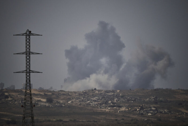 Smoke rises to the sky following an Israeli military strike in the Gaza Strip, as seen from southern Israel, Thursday, Sept. 18, 2025. (AP Photo/Leo Correa)