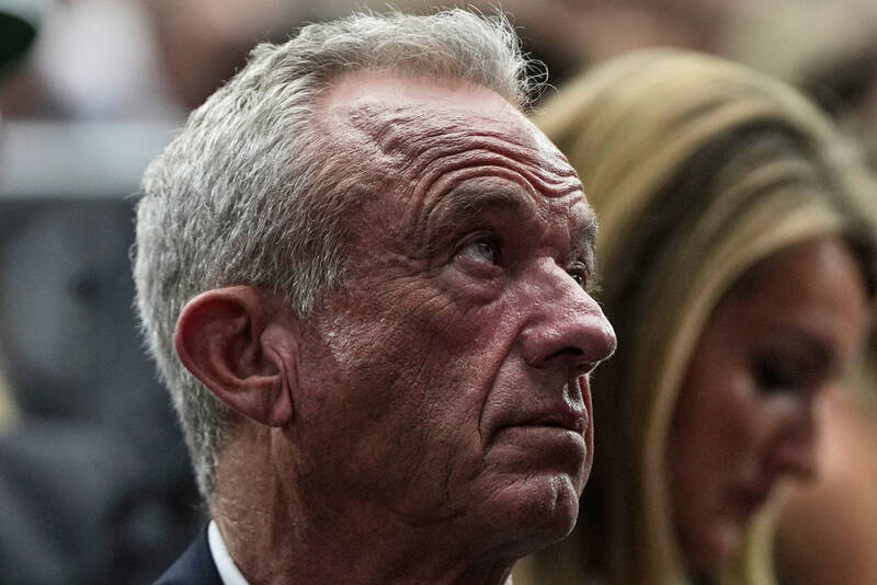 Health and Human Services Secretary Robert F. Kennedy Jr. attends a memorial for conservative activist Charlie Kirk, Sunday, Sept. 21, 2025, at State Farm Stadium in Glendale, Ariz. (AP Photo/Julia Demaree Nikhinson)