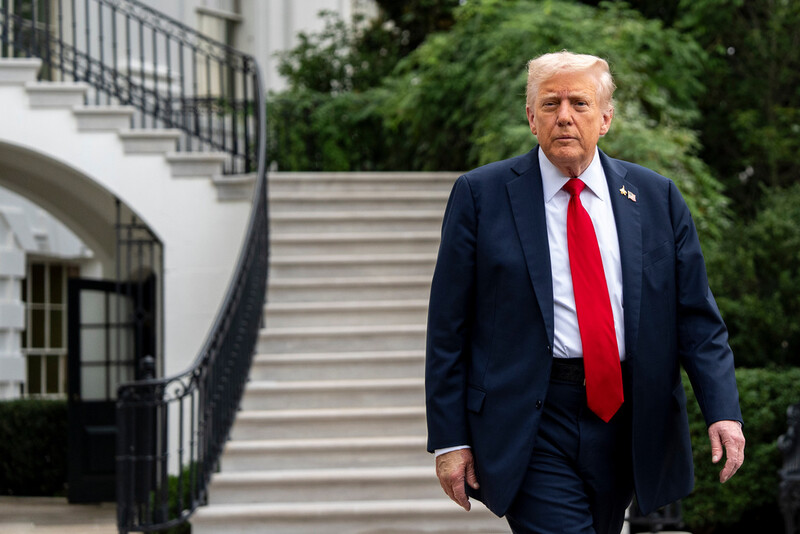 President Donald Trump walks to speak with reporters before departing on Marine One from the South Lawn of the White House, Tuesday, Sept. 30, 2025, in Washington. (AP Photo/Alex Brandon)