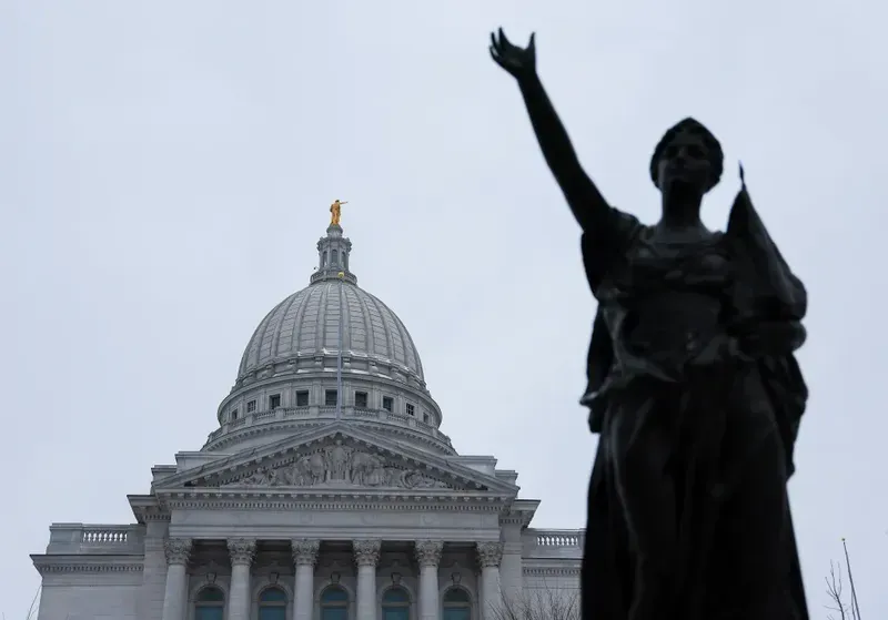 The Wisconsin State Capitol and the Forward statue. Photo by Ben Donahue.