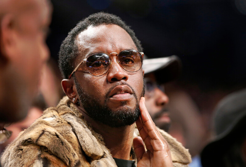 FILE - Sean "Diddy" Combs sits courtside in the second half of an NBA basketball game between the Brooklyn Nets and the New York Knicks, March 12, 2017, in New York. (AP Photo/Kathy Willens, File)