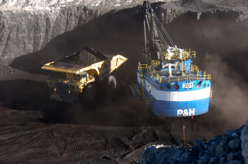 FILE - A haul truck is seen after being loaded with coal by a mechanized shovel at the Spring Creek mine, in this Nov. 15, 2016 photo, near Decker, Mont. (AP Photo/Matthew Brown)