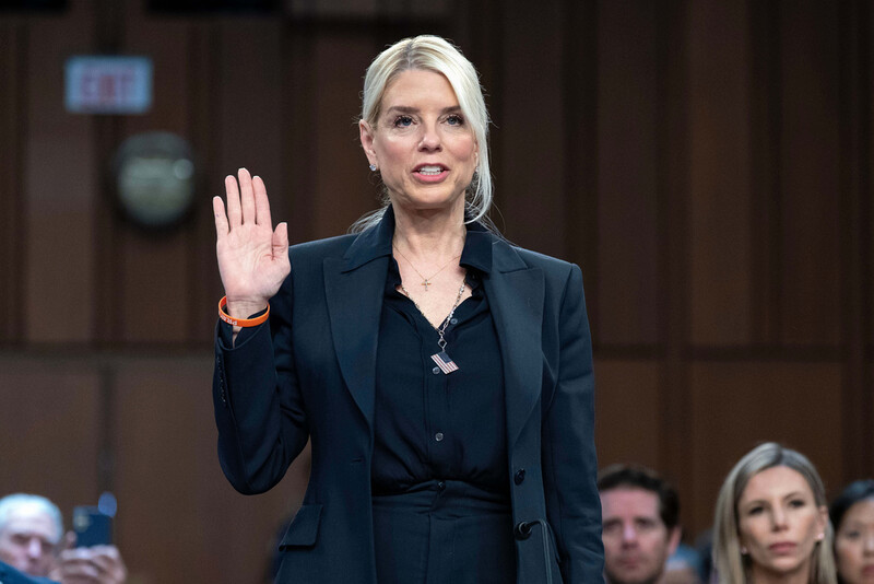 Attorney General Pam Bondi is sworn in before a Senate Judiciary Committee oversight hearing on Capitol Hill in Washington, Tuesday, Oct. 7, 2025. (AP Photo/Jose Luis Magana)