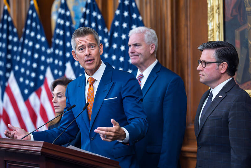 Transportation Secretary Sean Duffy speaks to reporters on day 23 of the government shutdown as he is joined by, from left, Rep. Lisa McClain, R-Mich., House Majority Whip Tom Emmer, R-Minn., and Speaker of the House Mike Johnson, R-La., at a news conference at the Capitol in Washington, Thursday, Oct. 23, 2025. (AP Photo/J. Scott Applewhite)