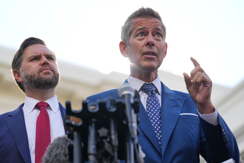 Transportation Secretary Sean Duffy speaks alongside Vice President JD Vance about the impact of the government shutdown on the aviation industry, outside of the West Wing of the White House, Thursday, Oct. 30, 2025, in Washington. (AP Photo/Jacquelyn Martin)