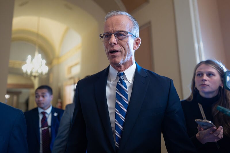Speaking to reporters, Senate Majority Leader John Thune, R-S.D., responds to Senate Democratic Leader Chuck Schumer to reopen the government if Republicans extend expiring health care subsidies for one year, at the Capitol in Washington, Friday, Nov. 7, 2025, day 38 of the government shutdown. (AP Photo/J. Scott Applewhite)