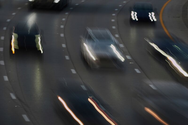 FILE - Vehicles drive along a highway July 30, 2025, in Cincinnati. (AP Photo/Joshua A. Bickel, File)