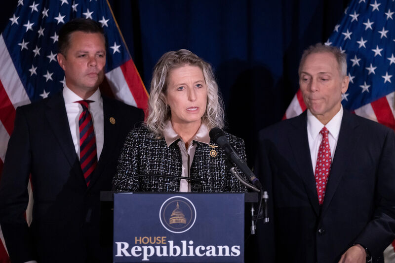 FILE - Rep. Jen Kiggans, R-Va., center, accompanied by Rep. Zachary Nunn, R-Iowa, left, and House Majority Leader Steve Scalise, R-La., right, speaks at a news conference at the Republican National Committee headquarters on Capitol Hill, in Washington, Wednesday, Sept. 18, 2024. (AP Photo/Ben Curtis, File)