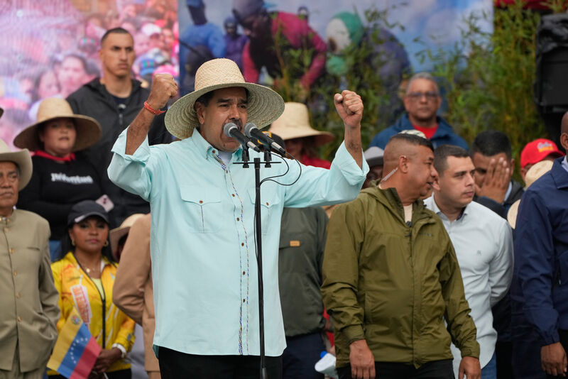 President Nicolas Maduro speaks during a rally marking the anniversary of the Battle of Santa Isabel, which took place during Venezuela's 19th-century Federal War, in Caracas, Venezuela, Wednesday, Dec. 10, 2025. (AP Photo/Ariana Cubillos)