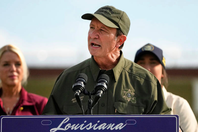 FILE - Louisiana Gov. Jeff Landry speaks to reporters at the Louisiana State Penitentiary in Angola, La., Sept. 3, 2025. (AP Photo/Gerald Herbert, File)