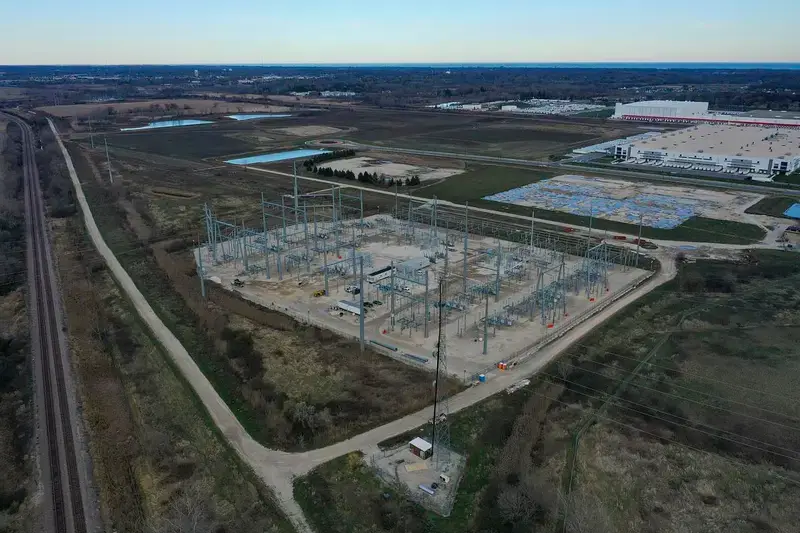 The sun sets as construction continues at Microsoft’s data center project on Nov. 13, 2025, in Mount Pleasant, Wis. (Joe Timmerman / Wisconsin Watch)