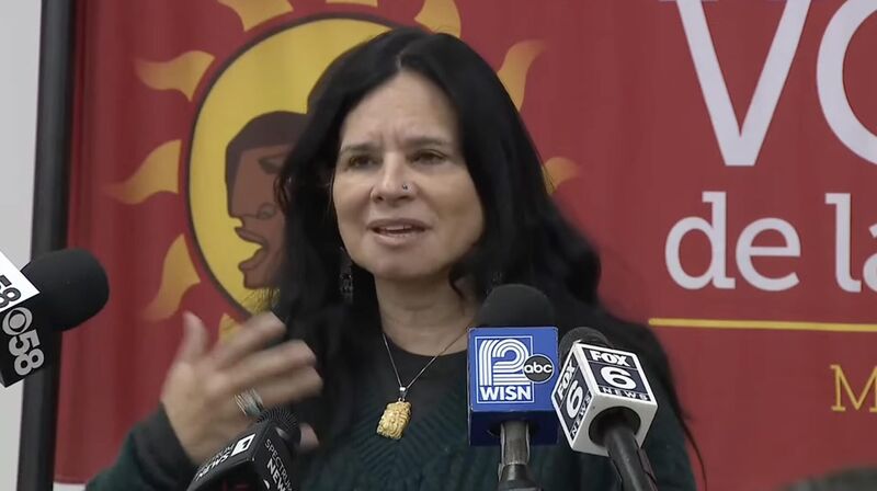 Christine Neumann Ortiz, executive director of Voces de la Frontera, speaks at a press conference on the Wisconsin Supreme Court case challenging the legality of Wisconsin law enforcement agencies’ cooperation agreements with ICE | Photo via Voces de la Frontera Facebook video