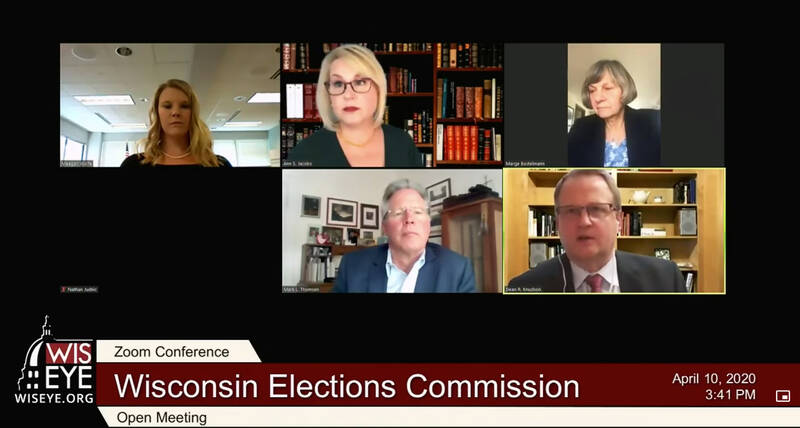 Members of the Wisconsin Elections Commission appear in a teleconference meeting on April 10, 2020. Clockwise from left are Administrator Meagan Wolfe, commissioners Ann Jacobs, Marge Bostelmann, Dean Knudson and Mark Thomsen. Commission member Robert “Bob” Spindell Jr. joined by phone, and commissioner Julie Glancey was off screen. Wisconsin Elections Commission via WisEye