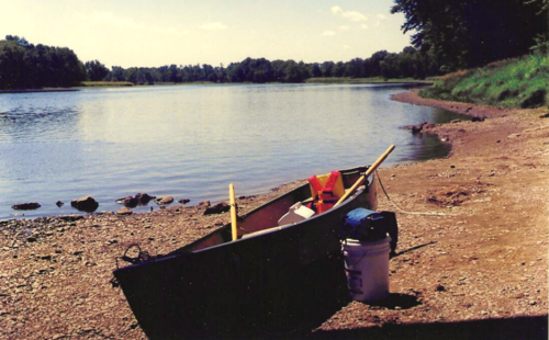 square stern canoe on the beach along the Chippewa river