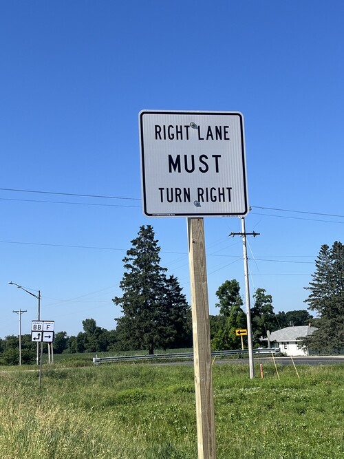 right lane must turn right sign