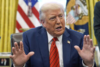 President Donald Trump speaks as he signs executive orders in the Oval Office of the White House, Thursday, April 17, 2025, in Washington. (AP Photo/Alex Brandon)