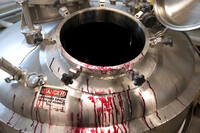 Beet juice is seen on a mixing tank used in the making of coloring at Sensient Technologies Corp., a color additive manufacturing company, in St. Louis, on Wednesday, April 2, 2025. (AP Photo/Jeff Roberson)