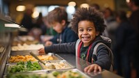 child eating school lunch