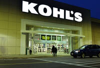 FILE - A pair of shoppers arrive at a Kohl's, Nov. 26, 2021, in Everett, Mass. (AP Photo/Josh Reynolds, file)