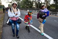 WASHINGTON (AP) — Dressed in a pink pullover, the 17-year-old girl rested her head in her hands, weighing her bleak options from the empty room of an shelter in Poughkeepsie, New York.  During a video call into an immigration courtroom in Manhattan, she listened as a lawyer explained to a judge how new regulations imposed by President Donald Trump's administration — for DNA testing, income verification and more — have hobbled efforts to reunite with her parents in the U.S. for more than 70 days.  As the adm