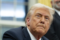 FILE - President Donald Trump speaks with reporters as he signs executive orders in the Oval Office at the White House, Feb. 10, 2025, in Washington. (AP Photo/Alex Brandon, file)