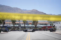 Police tape is placed across a street after an explosion Saturday, May 17, 2025, in Palm Springs, Calif. (AP Photo/Eric Thayer)