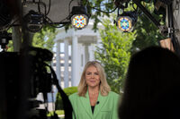 White House press secretary Karoline Leavitt does a television interview at the White House, Monday, June 2, 2025, in Washington. (AP Photo/Alex Brandon)