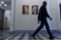 The new official portraits of President Donald Trump and Vice President JD Vance hang in the Eisenhower Executive Office Building on the White House campus, Monday, June 2, 2025, in Washington. (AP Photo/Alex Brandon)