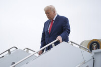 President Donald Trump arrives on Air Force One at Hagerstown Regional Airport, in Hagerstown, Md., on his was to Camp David, Md., Sunday, June 8, 2025. (AP Photo/Manuel Balce Ceneta)