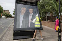 Activists put up a poster showing President Donald Trump and Jeffrey Epstein near the U.S. Embassy in London, Thursday, July 17, 2025.(AP Photo/Thomas Krych)