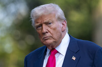 FILE - President Donald Trump walks from Marine One after arriving on the South Lawn of the White House, Tuesday, July 15, 2025, in Washington. (AP Photo/Alex Brandon, File)